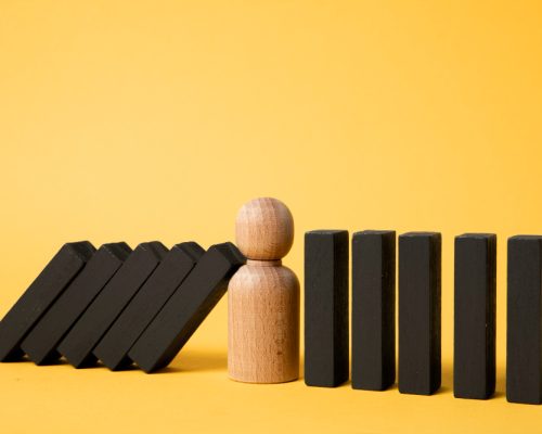dark-wooden-pieces-and-pawn-arrangement